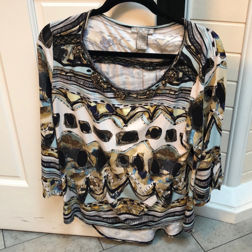 Flattering designer top